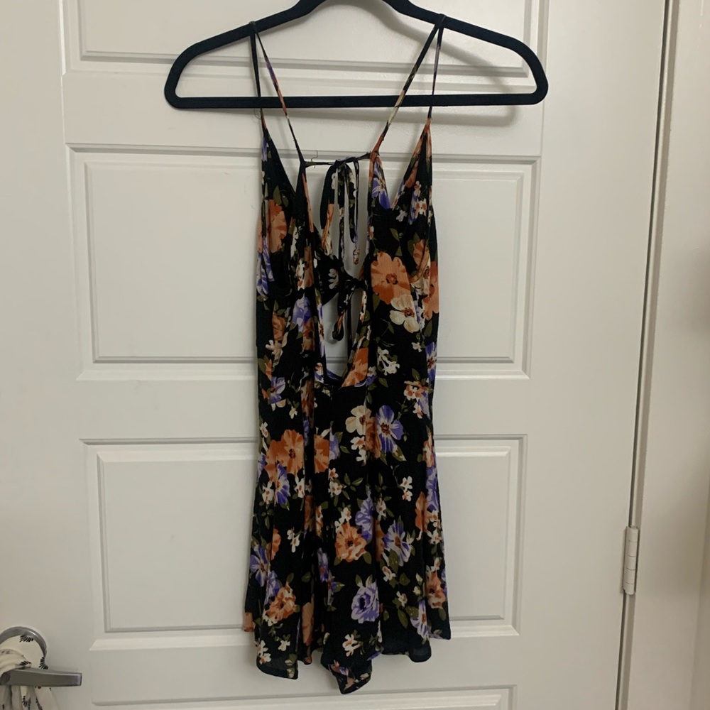 Black float also romper -urban outfitters